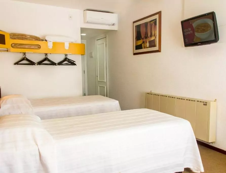 Quarto Luxo Triplo – Hotel Vinocap